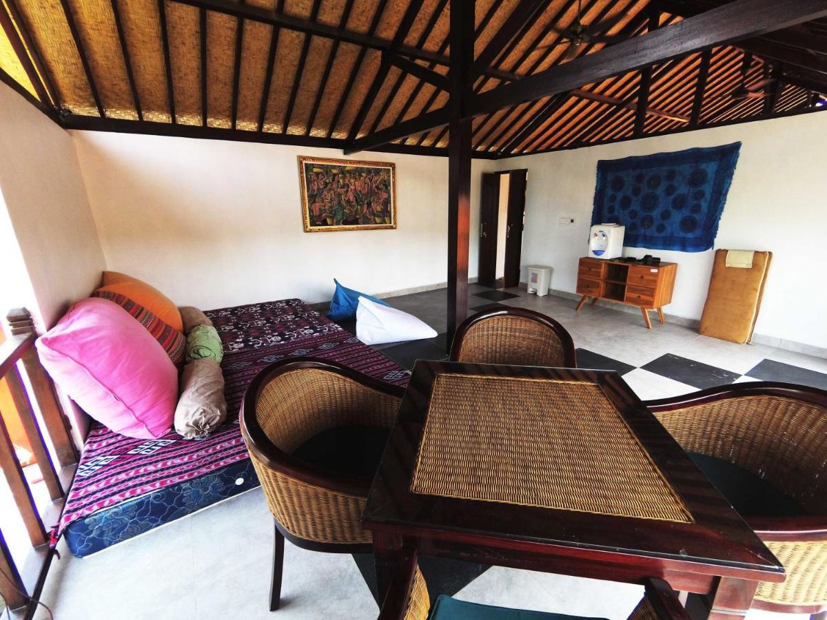 Capung Guesthouse Джимбаран Екстер'єр фото